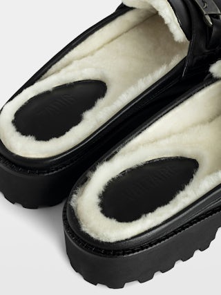 Joecassin Mules - Smooth leather lined mules adorned with a wing charm.