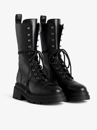Ride High-Top Boots - High-top ankle boots in smooth semi-glossy black leather adorned with a wing charm and laces.