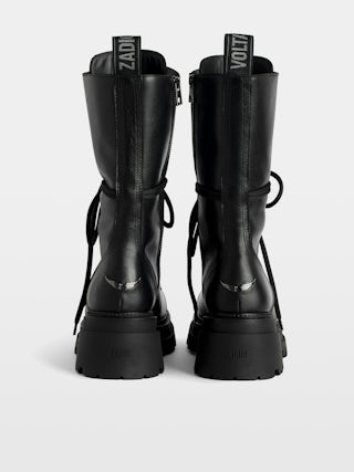 Ride High-Top Boots - High-top ankle boots in smooth semi-glossy black leather adorned with a wing charm and laces.