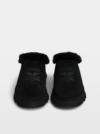 Teddy Shearling Mules - Mules in suede and shearling adorned with signature embroideries.