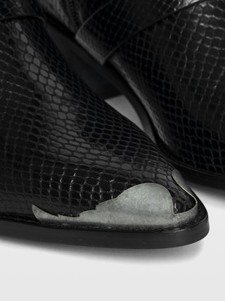 Ankle boots Tylow Wild Mirror - Ankle boots in python-effect leather adorned with signature buckles and metallic wing-shaped studs.