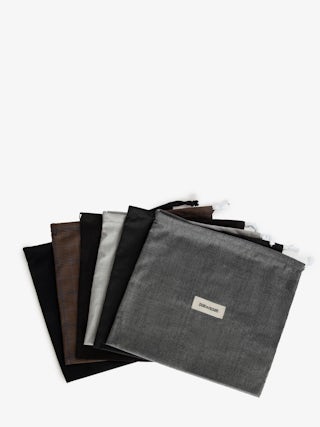 Low-Top Wings Trainers - Low-top trainers in smooth white leather, with off-white vintage leather inserts and off-white embossed snake-effect leather, signature wings. These trainers are made with materials that have a reduced environmental impact.