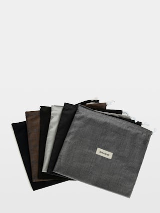 Low-Top Wings Trainers - Low-top trainers in smooth white leather, with off-white vintage leather inserts and off-white embossed snake-effect leather, signature wings. These trainers are made with materials that have a reduced environmental impact.