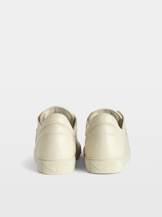 Low-Top Fly On Trainers - Vintage-effect leather low-top sneakers with embossed wings.