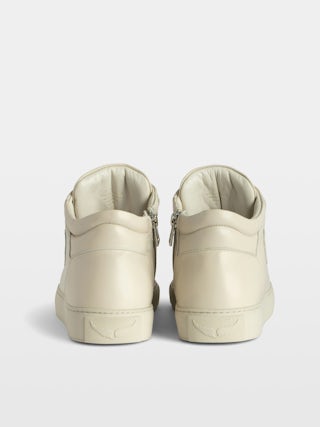 Mid Fly Trainers On - Vintage-effect leather high-top sneakers with embossed wings.