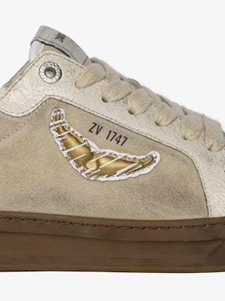 Basses Fly Wings Cracked Sneakers - Low-top sneakers in a mix of worn and cracked leather with embossed wings.