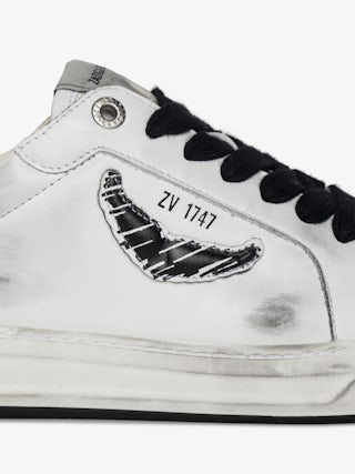 Basses Fly Wings Sneakers - Low-top sneakers in worn-effect leather with embossed wings.