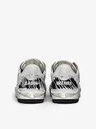 Basses Fly Wings Sneakers - Low-top sneakers in worn-effect leather with embossed wings.