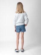 Elle Girls’ Shorts - Girls’ blue denim shorts with diamanté wings.