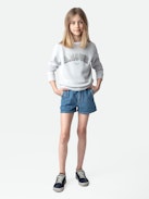 Elle Girls’ Shorts - Girls’ blue denim shorts with diamanté wings.