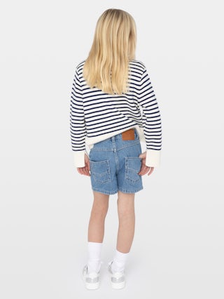 Shorts Elle Denim Girl - Denim shorts with front patch pockets, rhinestones and studs along the seams. Adjustable waist up to age 10.