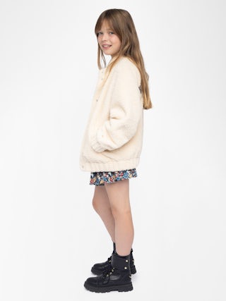 Maddy Girl's Jacket - Round neck jacket with elastic cuffs and hem, piped pocket, felt logo and embroidery on the back.