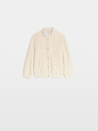 Maddy Girl's Jacket - Round neck jacket with elastic cuffs and hem, piped pocket, felt logo and embroidery on the back.