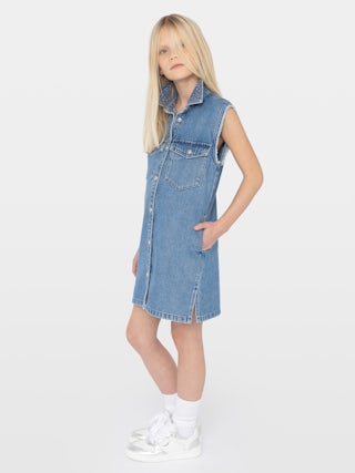Dress Rosie Denim Girl - Sleeveless denim shirt dress. Flap chest pockets. Collar with studs and rhinestones. Side seam pockets.