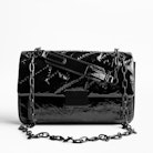 Sac Ziggy Patent - Sac noir femme en cuir matelassé verni.