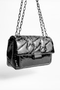 Sac Ziggy Patent - Sac noir femme en cuir matelassé verni.