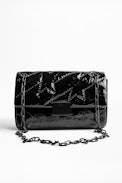 Sac Ziggy Patent - Sac noir femme en cuir matelassé verni.