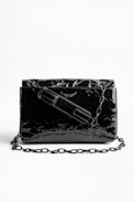 Sac Ziggy Patent - Sac noir femme en cuir matelassé verni.