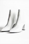 Glimmer Vernis Ankle Boots - Women’s heeled ankle boots in white patent leather.