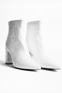 Glimmer Vernis Ankle Boots - Women’s heeled ankle boots in white patent leather.