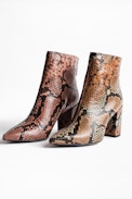 Glimmer Wild Ankle Boots - Women’s heeled ankle boots in snake print leather.