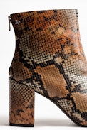 Glimmer Wild Ankle Boots - Women’s heeled ankle boots in snake print leather.