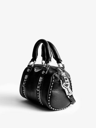 Borsa Sunny Nano Studs - Iconica borsa Sunny Nano in pelle granata decorata con borchie argentate.