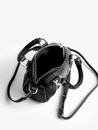 Borsa Sunny Nano Studs - Iconica borsa Sunny Nano in pelle granata decorata con borchie argentate.