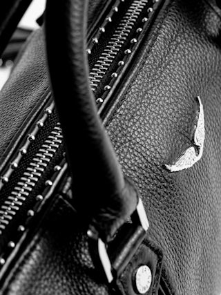 XS Sunny Studs Bag - Iconic Sunny XS bag in grained leather adorned with silver studs.