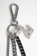 Llavero ZV Initiale Le Keyring - Llavero adornado con strass de metal plateado y ennegrecido