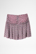 Javala short skirt - Patterned short skirt on pink background