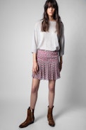 Javala short skirt - Patterned short skirt on pink background