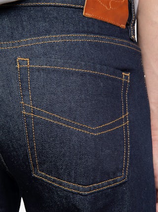 Jean John - Straight raw denim jeans with zip fastening.