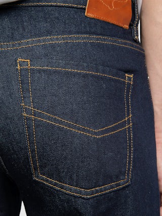 Jean John - Straight raw denim jeans with zip fastening.