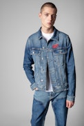 Base Denim Jacket - Men's blue denim jacket with embroidered skull. Made with fibers from organic farming.