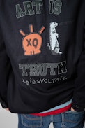 Light Bertie Jacket - Men’s navy blue cotton jacket with ‘Art is truth’ and skull patches on back