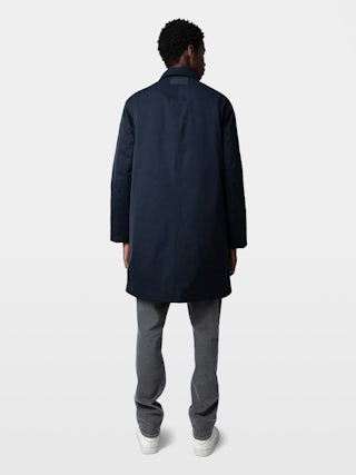 Coat Mel - Mid-length unisex coat with rubber studio patch at the back.