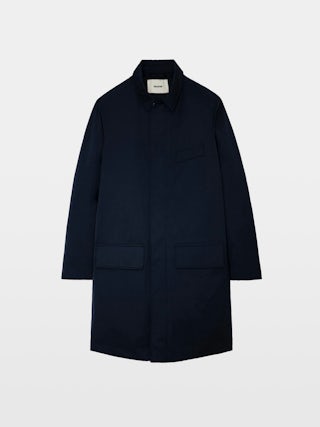 Coat Mel - Mid-length unisex coat with rubber studio patch at the back.