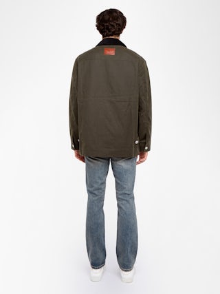 Parka Boye - Blouson en coton ciré, col contrasté en velours, fermeture boutonnée avec poches plaquées et patch jacron aile au dos.