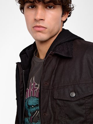 Bases Jacket - jacket in coated cotton, long sleeves with button closure and wing embroideries on the back.