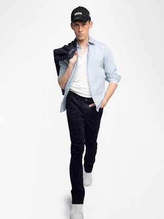 Steeve Corduroy Trousers - Corduroy pants with button opening.