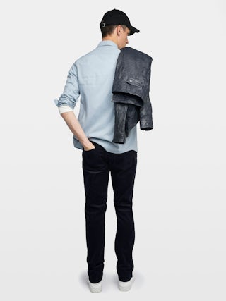 Steeve Corduroy Trousers - Corduroy pants with button opening.