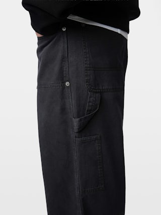 Pantalon Perry - Pantalon style worker avec patch à l'avant et détails rivets.