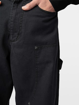 Pantalon Perry - Pantalon style worker avec patch à l'avant et détails rivets.