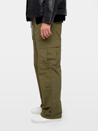 Pantalon Palmyr - Pantalon large et fluide à taille élastiquée avec cordon, boutonnage central et fermeture zippée accompagné d'une broderie.