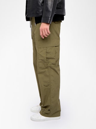 Pantalon Palmyr - Pantalon large et fluide à taille élastiquée avec cordon, boutonnage central et fermeture zippée accompagné d'une broderie.