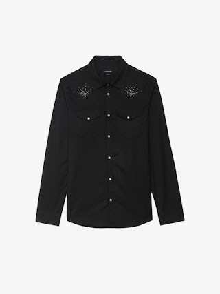 Saby Shirt - Denim shirt with flannel finish, flap pockets with wing embroidery, western-inspired details, studs, long sleeves and button fastening.