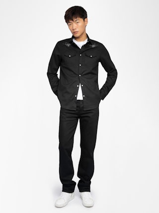 Saby Shirt - Denim shirt with flannel finish, flap pockets with wing embroidery, western-inspired details, studs, long sleeves and button fastening.