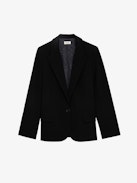 Blazer Voyage - Veste blazer noire oversize à col en pointe, fermeture boutonnée et poches.