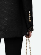 Blazer Vicka - Americana negra de tweed con bolsillos, cierre y manga abotonada.